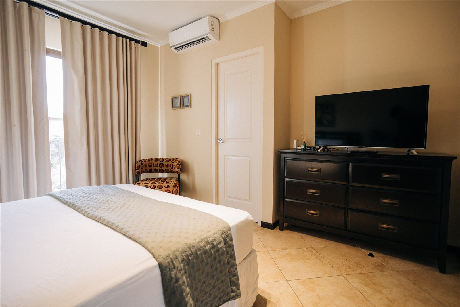 Television and air conditioning in the second bedroom