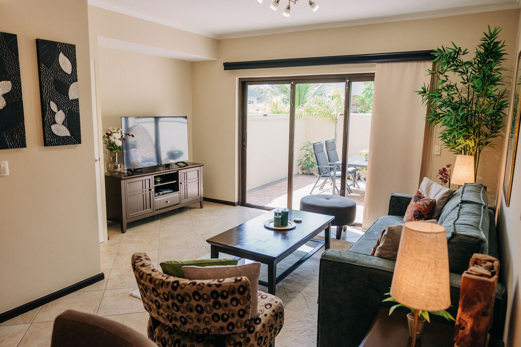 Comfortable living room opening onto the patio